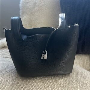 Inspired leather bucket bag